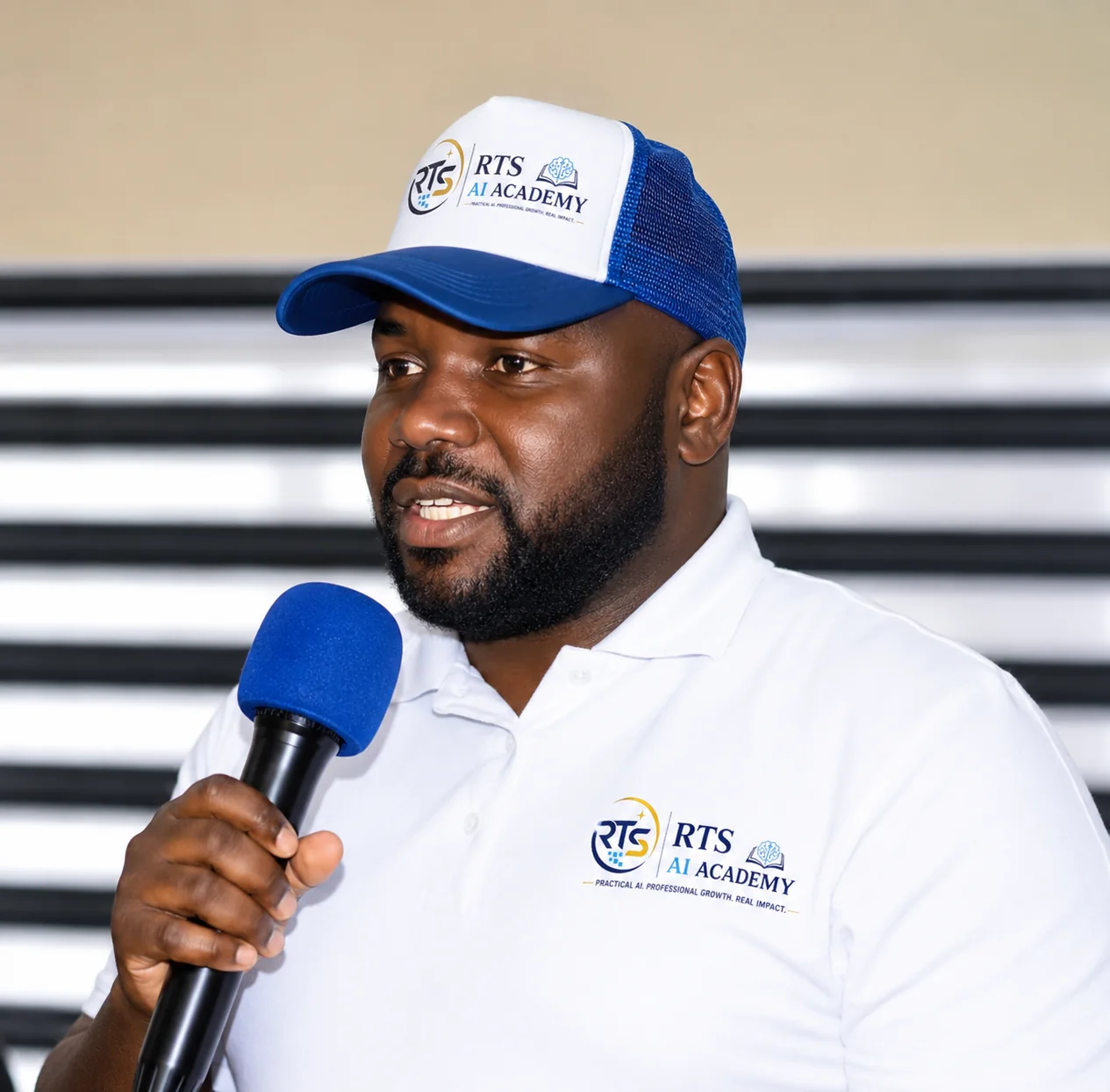 Samuel Ateh Stephen speaking in RTS AI Academy apparel